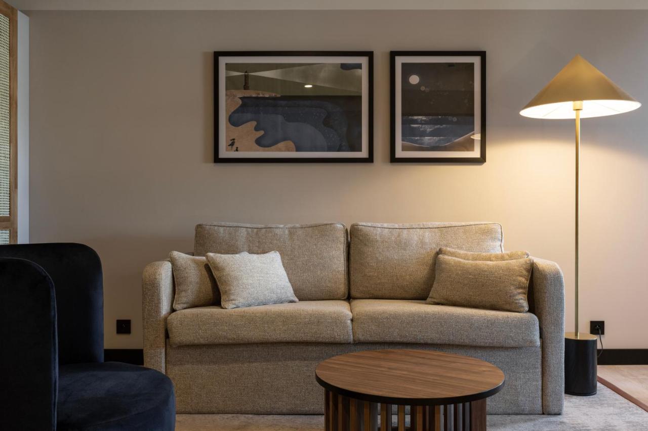 Royal Tulip Sand Колобжег Экстерьер фото A sofa
